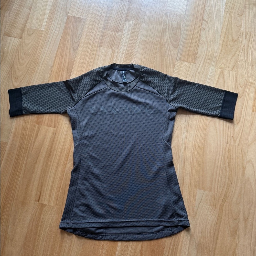 Woman’s Black and Gray Athletic Shirt Canyon